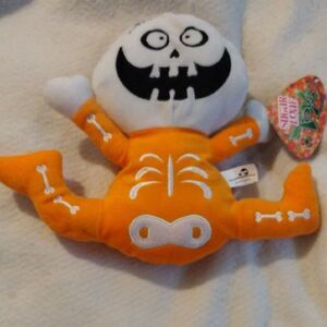 NWT Skeleton Happy Boy Plush Toy  Orange and White